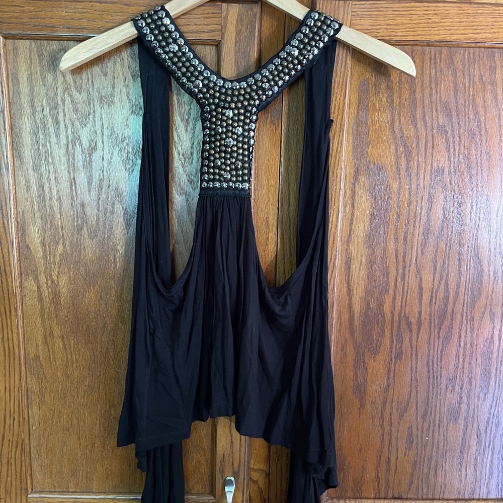 Vest with beaded design on back